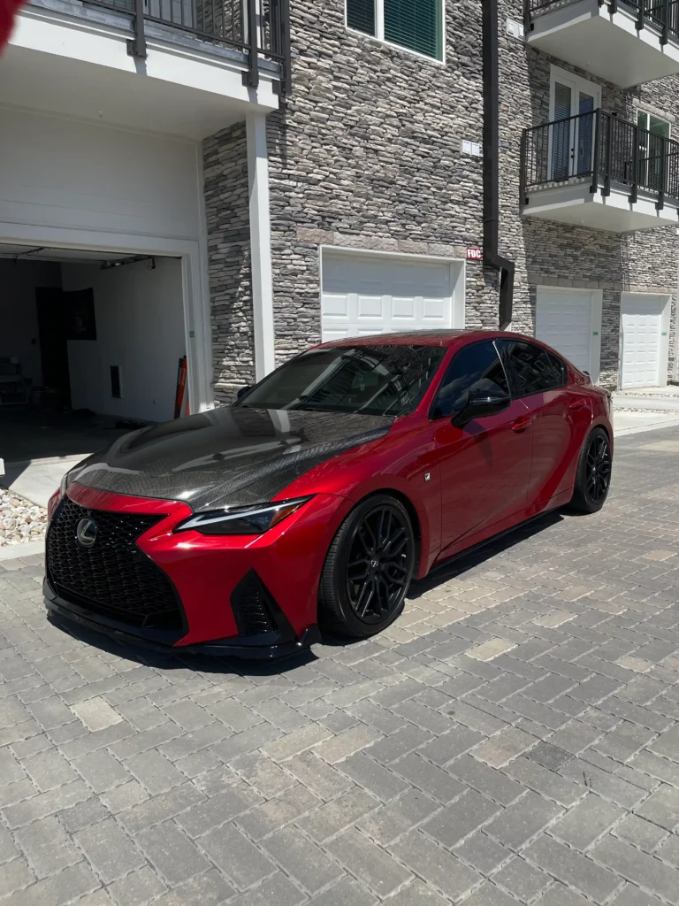 Applying carbon window tint to a car in Nashville by Shade Shoppe